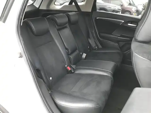 ホンダ シャトル ハイブリッド Z ホンダセンシング 鳥取県 2018(平30)年 8.9万km ホワイトオーキッドパール 純正ナビ/フルセグ/CD/DVD/BT/バックカメラ・ETC/ホンダセンシング/レーンキープアシスト/レーダークルーズコントロール/ハーフレザーシート/ドライブレコーダー/LEDヘットライト/フォグライト/純正16インチアルミホイール/パドルシフト/プッシュエンジンスタート/スペアキー/純正フロアマット/ドアバイザー/保証書・取扱説明書