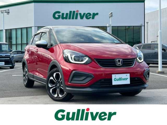 ホンダ フィット e:HEVクロスター 愛媛県 2020(令2)年 2.1万km プレミアムクリスタルレッドM ホンダセンシング/プッシュスタート/純正メモリナビ/バックカメラ/ETC/クルーズコントロール/横滑り防止装置/レーンキープアシスト/オートライト/オートマチックハイビーム/コーナーセンサー/アイドリングストップ/ステアリングスイッチ