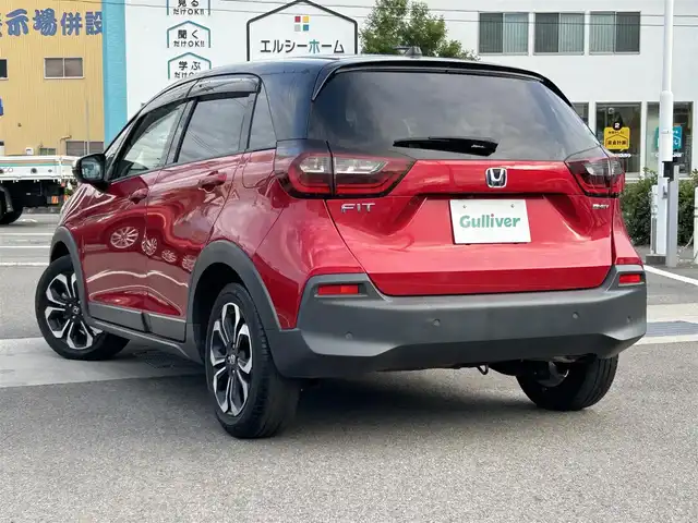ホンダ フィット e:HEVクロスター 愛媛県 2020(令2)年 2.1万km プレミアムクリスタルレッドM ホンダセンシング/プッシュスタート/純正メモリナビ/バックカメラ/ETC/クルーズコントロール/横滑り防止装置/レーンキープアシスト/オートライト/オートマチックハイビーム/コーナーセンサー/アイドリングストップ/ステアリングスイッチ