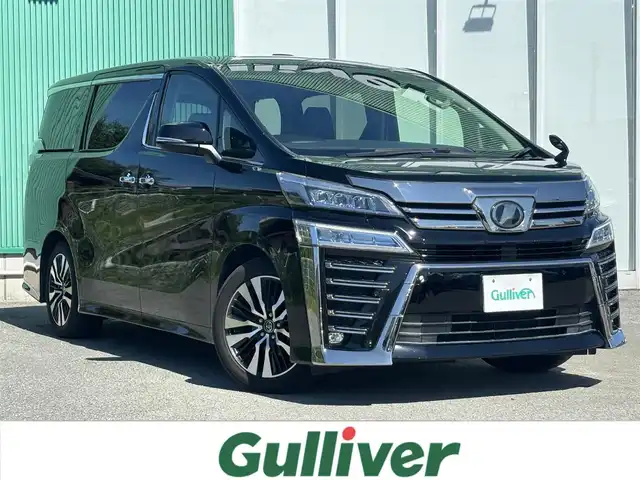 トヨタ ヴェルファイア Z Gエディション 福岡県 2018(平30)年 8.1万km ブラック ワンオーナー/トヨタセーフティセンス/サンルーフ/純正12.1型後席ディスプレイ/純正10型ナビ/（BT/フルセグ/DISC/SD/SDREC/AM/FM）/Bカメラ/両側パワースライドドア/レーダークルーズコントロール/LEDヘッドライト/オートライト/オートマチックハイビーム/革シート/DN席パワーシート/シートメモリー/DN席エアシート/DN席シートヒーター/ステアリングヒーター/純正18インチAW/USB入力端子/HDMI入力端子/横滑り防止装置/コーナーセンサー/レーンキープアシスト/盗難防止装置/衝突軽減システム/スマートキー/ETC2.0/保証書/取扱説明書