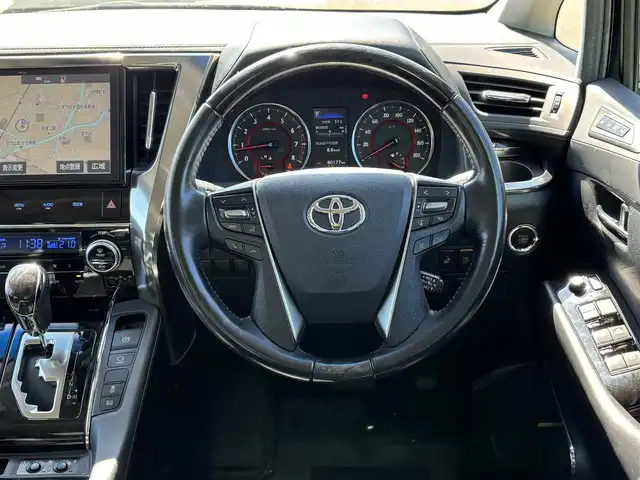 トヨタ ヴェルファイア Z Gエディション 福岡県 2018(平30)年 8.1万km ブラック ワンオーナー/トヨタセーフティセンス/サンルーフ/純正12.1型後席ディスプレイ/純正10型ナビ/（BT/フルセグ/DISC/SD/SDREC/AM/FM）/Bカメラ/両側パワースライドドア/レーダークルーズコントロール/LEDヘッドライト/オートライト/オートマチックハイビーム/革シート/DN席パワーシート/シートメモリー/DN席エアシート/DN席シートヒーター/ステアリングヒーター/純正18インチAW/USB入力端子/HDMI入力端子/横滑り防止装置/コーナーセンサー/レーンキープアシスト/盗難防止装置/衝突軽減システム/スマートキー/ETC2.0/保証書/取扱説明書