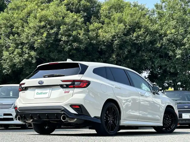 スバル レヴォーグ 1．8STIスポーツ EX 東京都 2021(令3)年 2.2万km クリスタルホワイトP ワンオーナー/純正ナビ/・Bluetoothオーディオ/USBオーディオ/・フルセグTV/Apple CarPlay/AndroidAuto/純正フロントバンパースカート/リヤアンダーディフューザー/STIフロントグリル/STI18インチアルミホイール/車外カメラ/・バック/サイド/フロント/本革シート/パワーシート/シートヒーター（前席）/パワーバックドア/取扱説明書/保証書/スペアキー1本