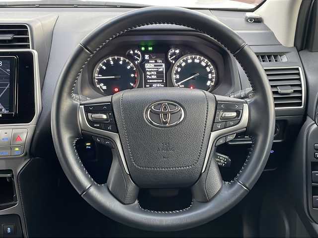 トヨタ ランドクルーザー プラド TX Lパッケージ 香川県 2021(令3)年 4.3万km ホワイトパールクリスタルシャイン Toyota Safety Sense/・プリクラッシュセーフティシステム/・レーンディパーチャーアラート/・オートマチックハイビーム/・レーダークルーズコントロール/・ロードサインアシスト/ディーラーオプション9インチナビ/→フルセグ/CD/DVD/Bluetooth/バックカメラ/サンルーフ/ブラックレザーシート/前席シートヒーター/ベンチレーション/MTモード付AT/LEDオートライト/LEDフォグランプ/革巻きステアリング/ステアリングリモコン/横滑り防止装置/盗難防止装置/純正ドライブレコーダー/ビルトインETC2.0/プッシュスタート/スマートキー