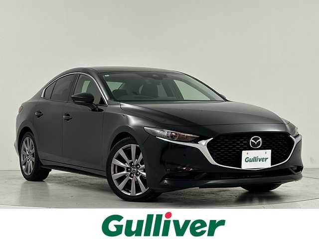 マツダ マツダ３セダン 20S プロアクティブ ツーリングS 大阪府 2020(令2)年 0.5万km ジェットブラックマイカ i-ACTIVESENSE/車線逸脱防止/横滑防止装置/レーダークルコン/マツダコネクトナビ/　BT/CD/DVD/HDMI/フルセグ/バックカメラ/D席パワーシート/D席メモリーシート/前席シートヒーター/ステアリングヒーター/パドルシフト/革巻ステアリング/ヘッドアップディスプレイ/アイドリングストップ/ETC/プッシュスタート