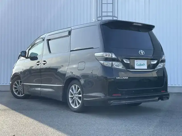 トヨタ ヴェルファイア 2．4Z 愛媛県 2009(平21)年 15.8万km ブラック フリップダウンモニター/サンルーフ/ビルトインETC/ドライブレコーダー前後/バックカメラ/両側パワースライドドア/フルセグTV/社外ナビ（ALPINE）/ウォークスルー/コーナーセンサー前後/横滑り防止装置/Bluetooth/スマートキー/純正17AW