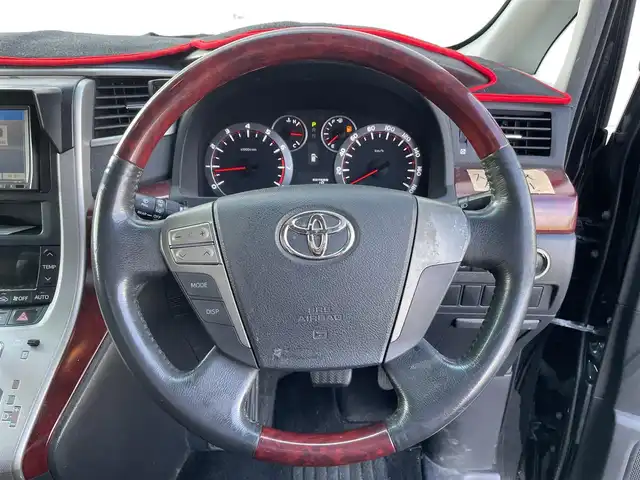 トヨタ ヴェルファイア 2．4Z 愛媛県 2009(平21)年 15.8万km ブラック フリップダウンモニター/サンルーフ/ビルトインETC/ドライブレコーダー前後/バックカメラ/両側パワースライドドア/フルセグTV/社外ナビ（ALPINE）/ウォークスルー/コーナーセンサー前後/横滑り防止装置/Bluetooth/スマートキー/純正17AW