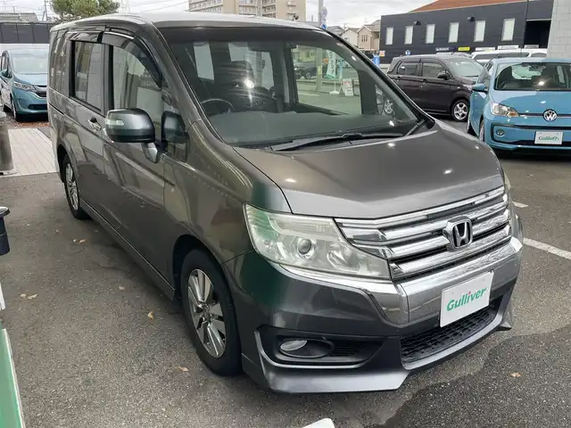 ホンダ ステップワゴン スパーダ Z 新潟県 2013(平25)年 7.8万km ポリッシュドメタルメタリック ワンオーナー/4WD/メモリナビ/ワンセグテレビ/純正ホイール装着/バックカメラ/アイドリングストップ/ドアバイザー/両側パワースライドドア/ETC/前後ドライブレコーダー/パドルシフト/ステアリングスイッチ/純正フロアマット/ECON/ドアバイザー/スペアキー1個