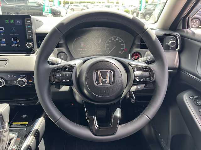 ホンダ ヴェゼル ハイブリッド e:HEV Z 長野県 2025(令7)年 0.1万km未満 プラチナホワイトパール ホンダセンシング/ホンダ純正Gathersナビ/FM・AM・フルセグTV/Bluetooth Audio/AppleCarPlay対応/バックカメラ/純正18インチアルミホイール/レーダークルーズコントロール/前後ドライブレコーダー（純正）/前後コーナーセンサー/電動リアゲート/電動パーキング/ブレーキホールド/ステアリングヒーター/ハーフレザーシート/前席シートヒーター/置くだけ充電/パドルシフト/LEDヘッドライト/オートライト/プッシュスタート/スマートキー/スペアキー/ドアバイザー/取扱説明書/保証書/ETC