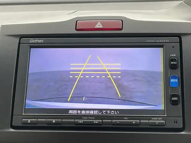 ホンダ フリード ハイブリット プレミアムエディション 岡山県 2016(平28)年 6.8万km ホワイトオーキッドパール 純正メモリナビゲーション/(CD/DVD/SD/BT/USB/ワンセグTV)/バックカメラ/ビルトインETC/社外ドライブレコーダー前後/ハーフレザーシート/両側パワースライドドア/スマートキー×2/ステアリングリモコン/チルトステアリング/クルーズコントロール/シートリフター/HIDヘッドライト/フォグランプ/横滑り防止/ISOFIX/純正フロアマット/純正リアスポイラー/保証書/取扱説明書