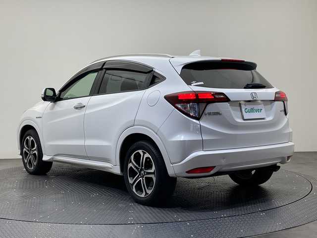 ホンダ ヴェゼル ハイブリッド Z ホンダセンシング 愛媛県 2018(平30)年 14万km ホワイトオーキッドパール 純正ナビ/ワンセグ／Ｂｌｕｅｔｏｏｔｈ／ＵＳＢ/バックカメラ/衝突被害軽減ブレーキ/クルーズコントロール/ＥＴＣ/ＤＮ席シートヒーター/ＬＥＤヘッドライト/ハーフレザーシート/チップアップシート/スペアキー