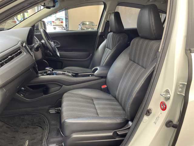 ホンダ ヴェゼル ハイブリッド Z ホンダセンシング 愛媛県 2018(平30)年 14万km ホワイトオーキッドパール 純正ナビ/ワンセグ／Ｂｌｕｅｔｏｏｔｈ／ＵＳＢ/バックカメラ/衝突被害軽減ブレーキ/クルーズコントロール/ＥＴＣ/ＤＮ席シートヒーター/ＬＥＤヘッドライト/ハーフレザーシート/チップアップシート/スペアキー