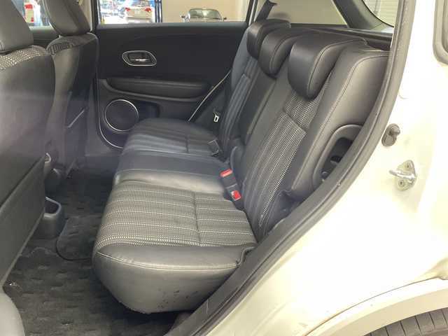 ホンダ ヴェゼル ハイブリッド Z ホンダセンシング 愛媛県 2018(平30)年 14万km ホワイトオーキッドパール 純正ナビ/ワンセグ／Ｂｌｕｅｔｏｏｔｈ／ＵＳＢ/バックカメラ/衝突被害軽減ブレーキ/クルーズコントロール/ＥＴＣ/ＤＮ席シートヒーター/ＬＥＤヘッドライト/ハーフレザーシート/チップアップシート/スペアキー