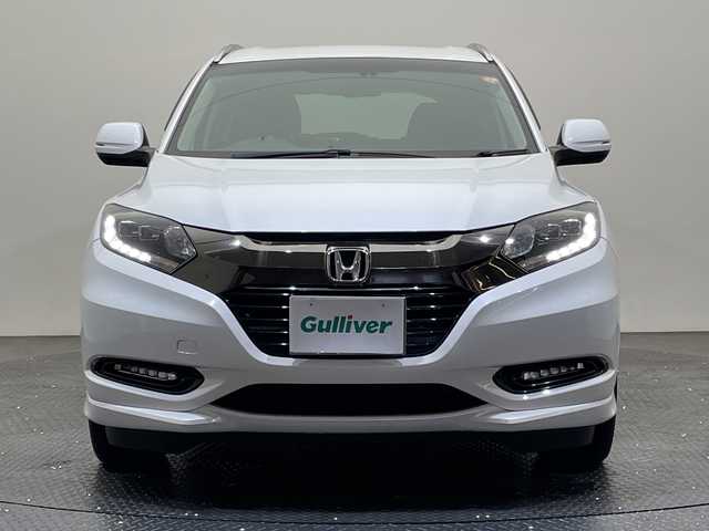 ホンダ ヴェゼル ハイブリッド Z ホンダセンシング 愛媛県 2018(平30)年 14万km ホワイトオーキッドパール 純正ナビ/ワンセグ／Ｂｌｕｅｔｏｏｔｈ／ＵＳＢ/バックカメラ/衝突被害軽減ブレーキ/クルーズコントロール/ＥＴＣ/ＤＮ席シートヒーター/ＬＥＤヘッドライト/ハーフレザーシート/チップアップシート/スペアキー