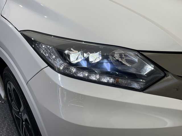 ホンダ ヴェゼル ハイブリッド Z ホンダセンシング 愛媛県 2018(平30)年 14万km ホワイトオーキッドパール 純正ナビ/ワンセグ／Ｂｌｕｅｔｏｏｔｈ／ＵＳＢ/バックカメラ/衝突被害軽減ブレーキ/クルーズコントロール/ＥＴＣ/ＤＮ席シートヒーター/ＬＥＤヘッドライト/ハーフレザーシート/チップアップシート/スペアキー