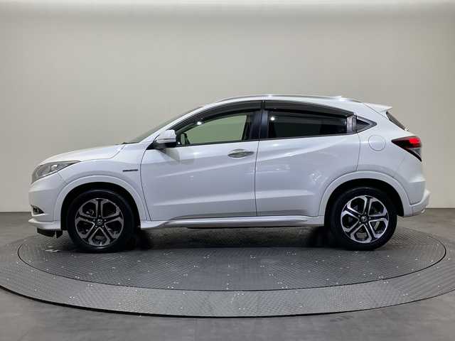 ホンダ ヴェゼル ハイブリッド Z ホンダセンシング 愛媛県 2018(平30)年 14万km ホワイトオーキッドパール 純正ナビ/ワンセグ／Ｂｌｕｅｔｏｏｔｈ／ＵＳＢ/バックカメラ/衝突被害軽減ブレーキ/クルーズコントロール/ＥＴＣ/ＤＮ席シートヒーター/ＬＥＤヘッドライト/ハーフレザーシート/チップアップシート/スペアキー