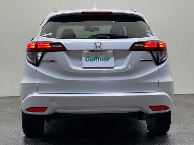 ホンダ ヴェゼル ハイブリッド Z ホンダセンシング 愛媛県 2018(平30)年 14万km ホワイトオーキッドパール 純正ナビ/ワンセグ／Ｂｌｕｅｔｏｏｔｈ／ＵＳＢ/バックカメラ/衝突被害軽減ブレーキ/クルーズコントロール/ＥＴＣ/ＤＮ席シートヒーター/ＬＥＤヘッドライト/ハーフレザーシート/チップアップシート/スペアキー