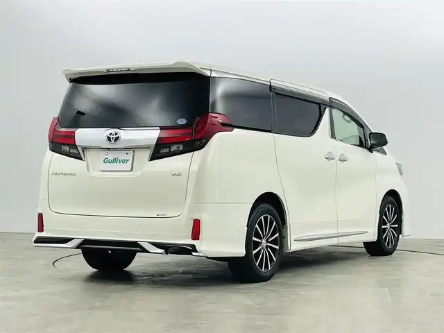 トヨタ アルファード SA 福島県 2015(平27)年 6.3万km ラグジュアリーホワイトパールクリスタルシャインガラスフレーク ４WD/モデリスタエアロ/純正ナビ/・フルセグ/CD/SD/FM/AM/BT/・バックカメラ/・ビルトインETC/純正フリップダウンモニター/両側パワースライドドア/社外前後ドライブレコーダー/革巻きステアリング/・ステアリングスイッチ/・クルーズコントロール/LEDヘッドライト/・フォグランプ/・オートライト/電動パーキングブレーキ/・ブレーキホールド/純正フロアマット/ドアバイザー/スマートキー/・プッシュスタート