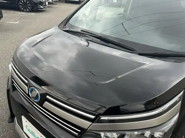 トヨタ ヴォクシー ハイブリッド ZS 煌Ⅱ 山形県 2016(平28)年 10.8万km ブラック 純正10インチナビ/FM/AM/フルセグ/Bluetooth/衝突軽減ブレーキ/車線逸脱防止/両側パワースライドア/純正バイザー/純正マット/LEDライト/フォグランプ/スペアキー/スマートキー/アルミ付きスタッドレスタイヤ積載