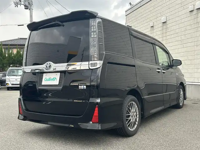 トヨタ ヴォクシー ハイブリッド ZS 煌Ⅱ 山形県 2016(平28)年 10.8万km ブラック 純正10インチナビ/FM/AM/フルセグ/Bluetooth/衝突軽減ブレーキ/車線逸脱防止/両側パワースライドア/純正バイザー/純正マット/LEDライト/フォグランプ/スペアキー/スマートキー/アルミ付きスタッドレスタイヤ積載