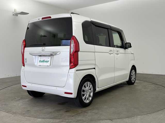 ホンダ Ｎ ＢＯＸ L 兵庫県 2021(令3)年 1万km プラチナホワイトパール ・社外ナビ（CN-RX06D）/CD/DVD/Blu-ray/TV/SD/Bluetooth/・バックカメラ/・助手席側パワースライドドア/・運転席&助手席シートヒーター/・左右独立式リアセンターアームレスト/・充電用USBジャック（急速充電対応タイプ2個付）/・ロールサンシェード（スライドドア両側）/・Honda SENSING/・衝突軽減ブレーキ/・誤発進抑制制御/・路外逸脱抑制システム/・アダプティブクルーズコントロール/・車線維持支援システム/・先行車発進おしらせ機能/・標識認識機能/・Hondaスマートキーシステム/・フルLEDヘッドライト/・クリアランスソナー/・ECONモード/・フロアマット/・プッシュスタート/・電動格納ミラー/・横滑り防止装置/・ヘッドライトレベライザー/・ドアバイザー/・プッシュスタート/・取扱説明書/・保証書/・スペアキー