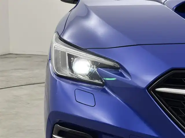 スバル レヴォーグ 1．8STIスポーツ EX 福岡県 2020(令2)年 3.8万km WRブルーパール STIエアロ　/メーカー１１．６型DAナビ／フルセグＴＶ　/Ｒ／Ｓカメラ　/デジタルインナーミラー　/ドラレコ　/ETC　/レーダークルコン　/コーナーセンサー　/衝突軽減ブレーキ　/レーンキープ　/ＢＳＭ　/パドルシフト　/赤黒コンビシート　/シートヒーター　/シートメモリー　/パワーバックドア