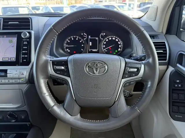 トヨタ ランドクルーザー プラド TX Lパッケージ 東京都 2019(平31)年 1.5万km ホワイトパールクリスタルシャイン セーフティセンス/プリクラッシュセーフティ/レーントレーシングアシスト/オートハイビーム/ブラインドスポットモニター/レーダークルーズ/純正メーカーナビ/CD/DVD/BT/AM/FM/TV/バックカメラ/LEDヘッドライト/フォグ/サンルーフ/ルーフレール/モデリスタエアロ/レザーシート（ベージュ）/シートヒーター/ベンチレーション/ビルトインETC2.0