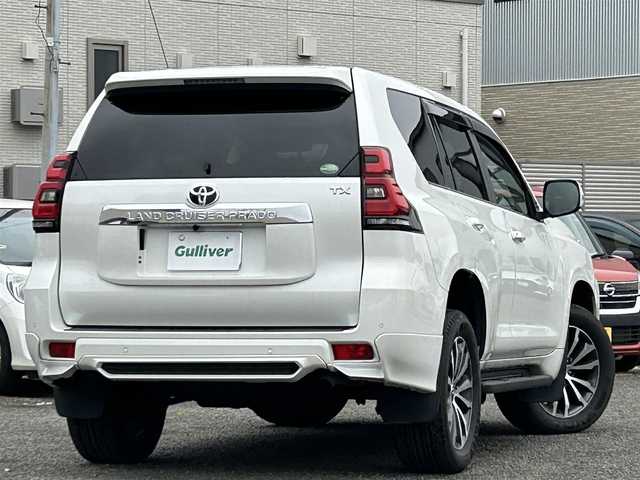 トヨタ ランドクルーザー プラド TX Lパッケージ 宮城県 2020(令2)年 6.5万km ホワイトパールクリスタルシャイン 装備/ベージュ内装/サンルーフ/ＴＲＤ前後エアロ/純正ナビ/(AM、FM、CD、DVD、フルセグTV、SD、BT、USB)/純正エンジンスターター×１/スペアキー×１/ＴＶキャンセラー/３列シート/ウッドステアリング/プッシュスタートボタン/ドアバイザー/機能/寒冷地仕様/レーダークルーズコントロール/レーンキープアシスト/シートヒーターD、N/シートクーラーD、N/パワーシートD、N/横滑り防止/2ndSTARTボタン/四駆切り替えボタン/オフロード切り替えボタン/リアフォグインジケーター/オートライト/アイドルアップ