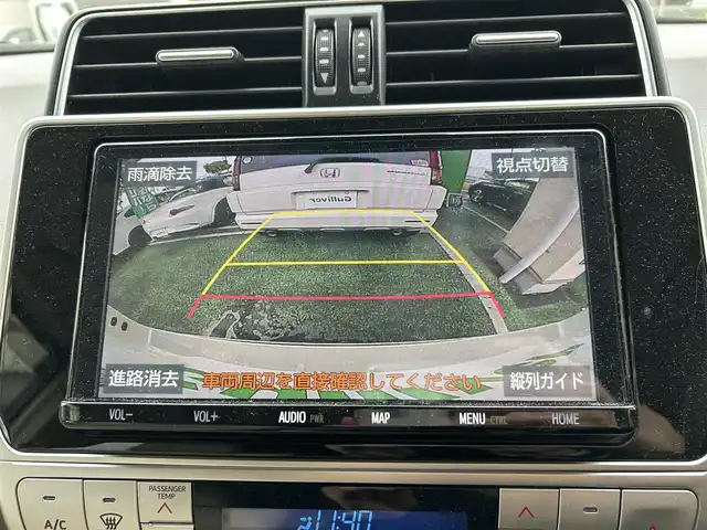 トヨタ ランドクルーザー プラド TX Lパッケージ 宮城県 2020(令2)年 6.5万km ホワイトパールクリスタルシャイン 装備/ベージュ内装/サンルーフ/ＴＲＤ前後エアロ/純正ナビ/(AM、FM、CD、DVD、フルセグTV、SD、BT、USB)/純正エンジンスターター×１/スペアキー×１/ＴＶキャンセラー/３列シート/ウッドステアリング/プッシュスタートボタン/ドアバイザー/機能/寒冷地仕様/レーダークルーズコントロール/レーンキープアシスト/シートヒーターD、N/シートクーラーD、N/パワーシートD、N/横滑り防止/2ndSTARTボタン/四駆切り替えボタン/オフロード切り替えボタン/リアフォグインジケーター/オートライト/アイドルアップ