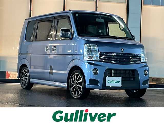 日産 ＮＶ１００クリッパー リオ G 山形県 2014(平26)年 14.2万km ライトブルーＭ ４WD/社外SDナビ/（AM/FM/TV/CD）/社外AW/純正フロアマット/バックカメラ/シートヒーター/両側パワースライドドア/電動格納ミラー/ドアバイザー/フォグランプ/スペアキー×１/スタッドレスタイヤ車載　スズキ純正AW