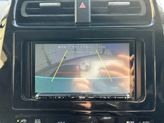 トヨタ プリウス E 長崎県 2016(平28)年 9.7万km シルバーM 社外メモリナビ/（CD/DVD/BT/フルセグ）/バックカメラ/社外エアロ（F/S/R下）/オートライト/ETC/スマートキー/プッシュスタート/社外17インチAW