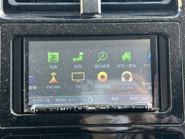 トヨタ プリウス E 長崎県 2016(平28)年 9.7万km シルバーM 社外メモリナビ/（CD/DVD/BT/フルセグ）/バックカメラ/社外エアロ（F/S/R下）/オートライト/ETC/スマートキー/プッシュスタート/社外17インチAW