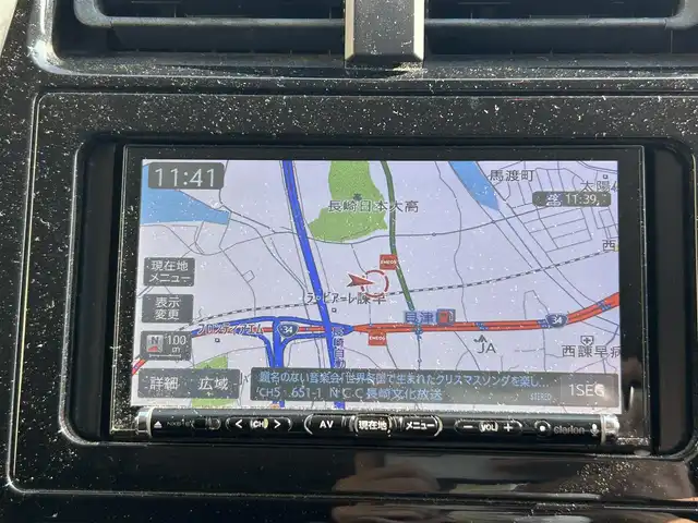 トヨタ プリウス E 長崎県 2016(平28)年 9.7万km シルバーM 社外メモリナビ/（CD/DVD/BT/フルセグ）/バックカメラ/社外エアロ（F/S/R下）/オートライト/ETC/スマートキー/プッシュスタート/社外17インチAW