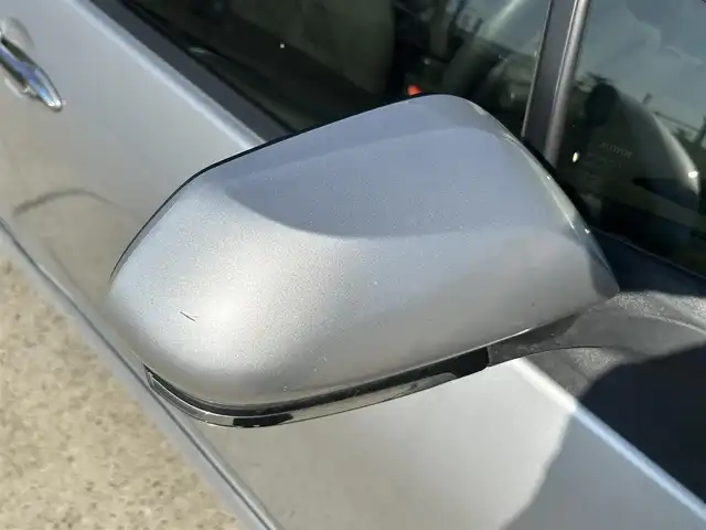 トヨタ プリウス E 長崎県 2016(平28)年 9.7万km シルバーM 社外メモリナビ/（CD/DVD/BT/フルセグ）/バックカメラ/社外エアロ（F/S/R下）/オートライト/ETC/スマートキー/プッシュスタート/社外17インチAW