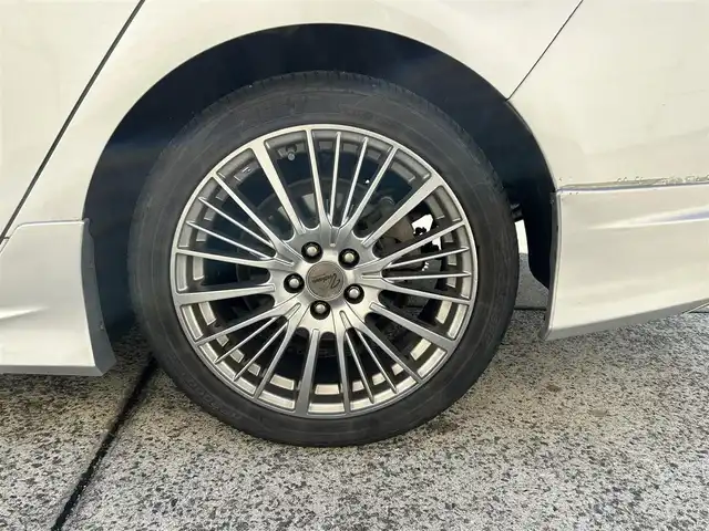 トヨタ プリウス E 長崎県 2016(平28)年 9.7万km シルバーM 社外メモリナビ/（CD/DVD/BT/フルセグ）/バックカメラ/社外エアロ（F/S/R下）/オートライト/ETC/スマートキー/プッシュスタート/社外17インチAW