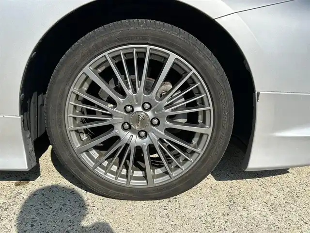 トヨタ プリウス E 長崎県 2016(平28)年 9.7万km シルバーM 社外メモリナビ/（CD/DVD/BT/フルセグ）/バックカメラ/社外エアロ（F/S/R下）/オートライト/ETC/スマートキー/プッシュスタート/社外17インチAW