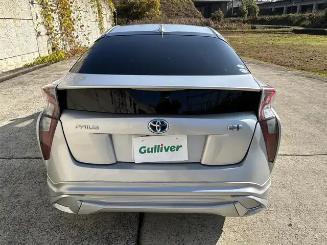 トヨタ プリウス E 長崎県 2016(平28)年 9.7万km シルバーM 社外メモリナビ/（CD/DVD/BT/フルセグ）/バックカメラ/社外エアロ（F/S/R下）/オートライト/ETC/スマートキー/プッシュスタート/社外17インチAW