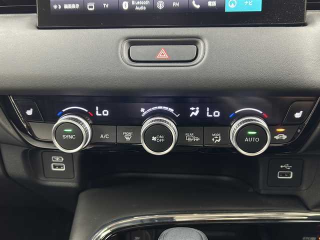ホンダ ヴェゼル ハイブリッド e:HEV Z 宮城県 2022(令4)年 4.9万km クリスタルブラックパール ワンオーナー/Honda SENSING/・衝突軽減ブレーキ/・アダプティブクルーズコントロール/・車線維持支援システム/・オートハイビーム/・ブラインドスポットインフォメーション/純正OPDAナビ/・BT.USB.スマホ連携/バックカメラ/フルセグTV/電動リアゲート/ハーフレザーシート/前席シートヒーター/革巻きステアリング/パドルシフト/ステアリングヒーター/ステアリングスイッチ/ビルトインETC2.0/ドライブレコーダー（FR）/プッシュスタート/スマートキー×2/電動パーキングブレーキ/ワイヤレス充電器/LEDヘッドライト/LEDフォグライト/純正フロアマット/社外18インチAW/冬タイヤ積込み/純正AW（225/50/18）/トノカバー/ドアバイザー