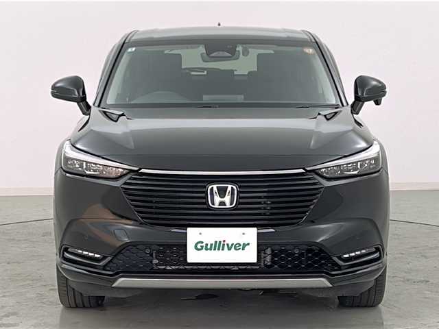 ホンダ ヴェゼル ハイブリッド e:HEV Z 宮城県 2022(令4)年 4.9万km クリスタルブラックパール ワンオーナー/Honda SENSING/・衝突軽減ブレーキ/・アダプティブクルーズコントロール/・車線維持支援システム/・オートハイビーム/・ブラインドスポットインフォメーション/純正OPDAナビ/・BT.USB.スマホ連携/バックカメラ/フルセグTV/電動リアゲート/ハーフレザーシート/前席シートヒーター/革巻きステアリング/パドルシフト/ステアリングヒーター/ステアリングスイッチ/ビルトインETC2.0/ドライブレコーダー（FR）/プッシュスタート/スマートキー×2/電動パーキングブレーキ/ワイヤレス充電器/LEDヘッドライト/LEDフォグライト/純正フロアマット/社外18インチAW/冬タイヤ積込み/純正AW（225/50/18）/トノカバー/ドアバイザー