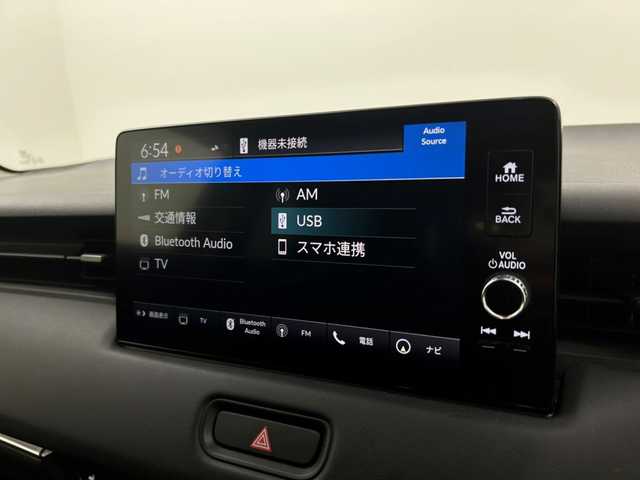 ホンダ ヴェゼル ハイブリッド e:HEV Z 宮城県 2022(令4)年 4.9万km クリスタルブラックパール ワンオーナー/Honda SENSING/・衝突軽減ブレーキ/・アダプティブクルーズコントロール/・車線維持支援システム/・オートハイビーム/・ブラインドスポットインフォメーション/純正OPDAナビ/・BT.USB.スマホ連携/バックカメラ/フルセグTV/電動リアゲート/ハーフレザーシート/前席シートヒーター/革巻きステアリング/パドルシフト/ステアリングヒーター/ステアリングスイッチ/ビルトインETC2.0/ドライブレコーダー（FR）/プッシュスタート/スマートキー×2/電動パーキングブレーキ/ワイヤレス充電器/LEDヘッドライト/LEDフォグライト/純正フロアマット/社外18インチAW/冬タイヤ積込み/純正AW（225/50/18）/トノカバー/ドアバイザー