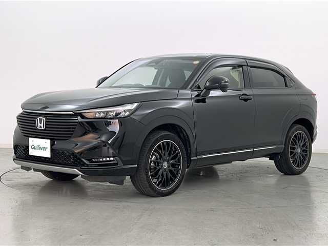 ホンダ ヴェゼル ハイブリッド e:HEV Z 岩手県 2022(令4)年 4.9万km クリスタルブラックパール ワンオーナー/Honda SENSING/・衝突軽減ブレーキ/・アダプティブクルーズコントロール/・車線維持支援システム/・オートハイビーム/・ブラインドスポットインフォメーション/純正OPDAナビ/・BT.USB.スマホ連携/バックカメラ/フルセグTV/電動リアゲート/ハーフレザーシート/前席シートヒーター/革巻きステアリング/パドルシフト/ステアリングヒーター/ステアリングスイッチ/ビルトインETC2.0/ドライブレコーダー（FR）/プッシュスタート/スマートキー×2/電動パーキングブレーキ/ワイヤレス充電器/LEDヘッドライト/LEDフォグライト/純正フロアマット/社外18インチAW/冬タイヤ積込み/純正AW（225/50/18）/トノカバー/ドアバイザー
