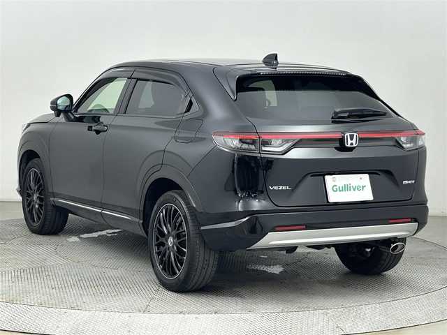 ホンダ ヴェゼル ハイブリッド e:HEV Z 道央・札幌 2022(令4)年 4.9万km クリスタルブラックパール ・ワンオーナー/・Honda SENSING/・衝突軽減ブレーキ/・アダプティブクルーズコントロール/・車線維持支援システム/・オートハイビーム/・ブラインドスポットインフォメーション/・純正OPDAナビ/　BT.USB.スマホ連携/・バックカメラ/・フルセグTV/・電動リアゲート/・ハーフレザーシート/・前席シートヒーター/・革巻きステアリング/・パドルシフト/・ステアリングヒーター/・ステアリングスイッチ/・ビルトインETC2.0/・ドライブレコーダー（FR）/・プッシュスタート/・スマートキー×2/・電動パーキングブレーキ/・ワイヤレス充電器/・LEDヘッドライト/・LEDフォグライト/・純正フロアマット/・社外18インチAW/・冬タイヤ積込み/　　純正AW（225/50/18）/・トノカバー/・ドアバイザー