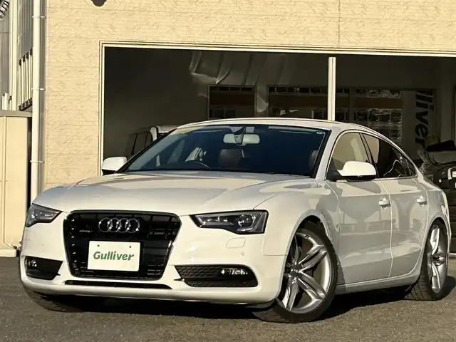 アウディ Ａ５ SB 2．0 TFSI クワトロ 宮城県 2013(平25)年 9.9万km アイビスホワイト 純正メーカーナビ/社外車高調/社外マフラー/スペアタイヤ/ワンセグＴＶ/ＡＭ／ＦＭ／ＣＤ／ＤＶＤ／Ｂｌｕｅｔｏｏｔｈ/クルーズコントロール/プリクラッシュセーフティ/横滑り防止装置/パーキングホールド/前席シートヒーター/前席パワーシート/レザーシート/オートLEDライト/スマートキー×２/純正AWスタッドレスタイヤ255/35/R19