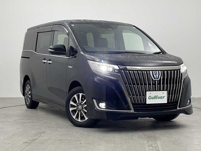 トヨタ エスクァイア ハイブリッド Gi プレミアムパッケージ ブラックテーラード 愛知県 2020(令2)年 6.2万km ブラック 禁煙車/純正9インチナビ（NSZT-Y68T）/・フルセグ・CD・DVD・Bluetooth・SD/純正フリップダウンモニター/両側パワースライドドア/バックカメラ/トヨタセーフティセンス/・プリクラッシュセーフティ/・オートマチックハイビーム/・レーンディパーチャーアラート/ステアリングヒーター/前席シートヒーター/ステアリングスイッチ/革巻きステアリング/クルーズコントロール/LEDヘッドライト（オートライト）/スマートキー/プッシュスタート/スペアスマートキー