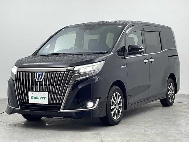 トヨタ エスクァイア ハイブリッド Gi プレミアムパッケージ ブラックテーラード 愛知県 2020(令2)年 6.2万km ブラック 禁煙車/純正9インチナビ（NSZT-Y68T）/・フルセグ・CD・DVD・Bluetooth・SD/純正フリップダウンモニター/両側パワースライドドア/バックカメラ/トヨタセーフティセンス/・プリクラッシュセーフティ/・オートマチックハイビーム/・レーンディパーチャーアラート/ステアリングヒーター/前席シートヒーター/ステアリングスイッチ/革巻きステアリング/クルーズコントロール/LEDヘッドライト（オートライト）/スマートキー/プッシュスタート/スペアスマートキー