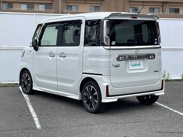 マツダ フレアワゴン カスタムスタイル ハイブリッド XT 秋田県 2018(平30)年 8万km ピュアホワイトP スズキセーフティサポート/　衝突被害軽減/　コーナーセンサー/　レーンキープアシスト/ターボ/４WD/MTモード付AT　パドルシフト/クルーズコントロール/社外ナビ/Bluetooth　フルセグTV　DVD　CD　SD　AM　FM/バックカメラ/ETC/両側パワースライドドア/シートヒーター前席/フロアマット/ハーフレザーシート/本革巻きステアリング/ステアリングスイッチ/スマートキー