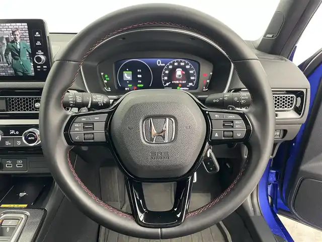 ホンダ シビック e:HEV 愛知県 2023(令5)年 2.7万km プレミアムクリスタルブルークリスタル ワンオーナー/ホンダセンシング/　　・衝突軽減ブレーキシステム/　　・車線維持支援システム/　　・アダプティブクルーズコントロール/　　・トラフィックジャムアシスト/　　・オートハイビーム/　　・アダプティブドライビングビーム/アルパイン製デジタルインナーミラー/アルパイン製ドライブレコーダー/純正9インチナビ/　　・BT/フルセグ/BOSEプレミアムサウンドシステム/バックカメラ/ビルトインETC2.0/置くだけ充電/革巻きステアリング/ステアリングリモコン/パドルシフト/ハーフレザーシート/パワーシート（前席）/シートヒーター（前席）/テールゲートスポイラー/純正LEDヘッドライト/フォグランプ/純正18インチアルミホイール/取扱説明書/保証書