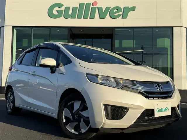 ホンダ フィット ハイブリット Fパッケージ 栃木県 2013(平25)年 9.5万km プレミアムホワイトパール 純正ナビ/バックカメラ/ステリモ/ETC/スマートキー×2