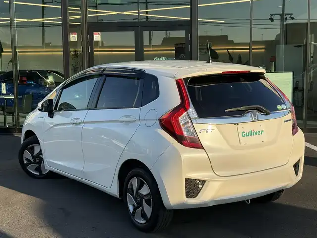 ホンダ フィット ハイブリット Fパッケージ 栃木県 2013(平25)年 9.5万km プレミアムホワイトパール 純正ナビ/バックカメラ/ステリモ/ETC/スマートキー×2