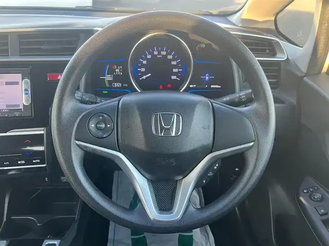 ホンダ フィット ハイブリット Fパッケージ 栃木県 2013(平25)年 9.5万km プレミアムホワイトパール 純正ナビ/バックカメラ/ステリモ/ETC/スマートキー×2