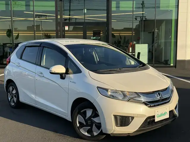 ホンダ フィット ハイブリット Fパッケージ 栃木県 2013(平25)年 9.5万km プレミアムホワイトパール 純正ナビ/バックカメラ/ステリモ/ETC/スマートキー×2